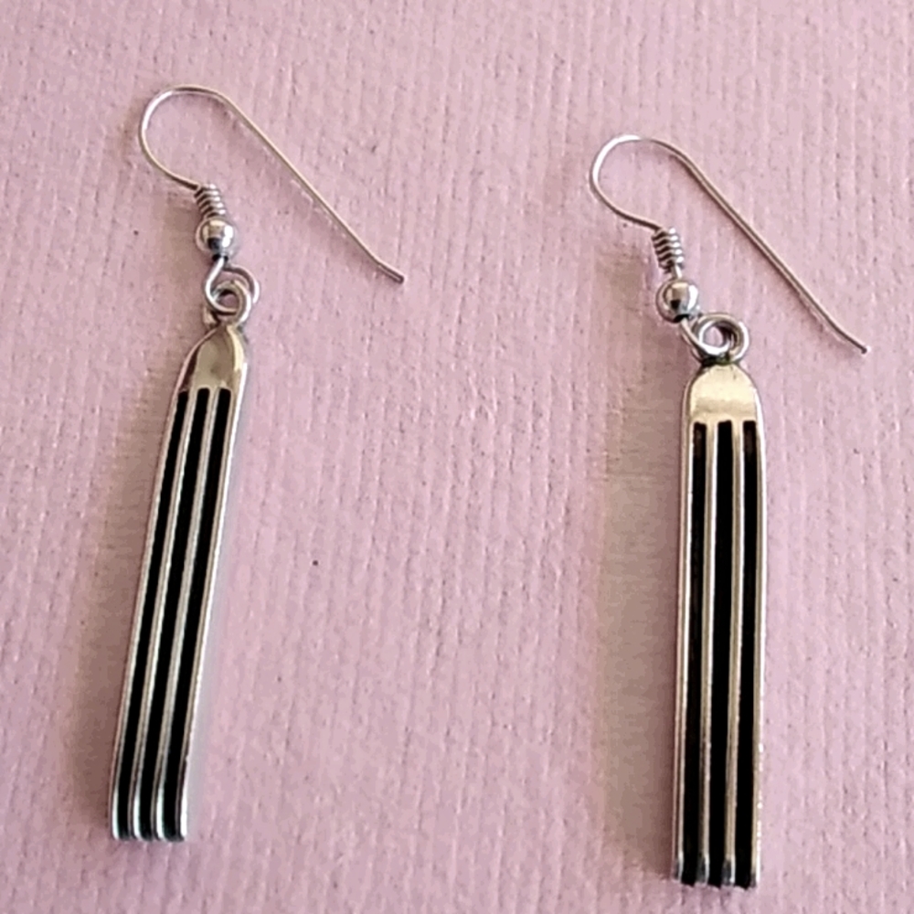 Native American crafted sterling silver earrings.